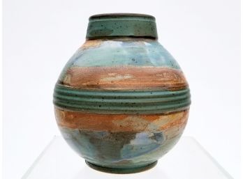 A Middle Eastern Glazed Earthenware Vase