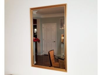 A Gilt Framed Beveled Mirror