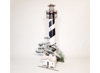 A Large Metal Lighthouse Art Sculpture