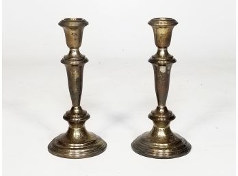 A Pair Of Vintage Weighted Sterling Candlesticks