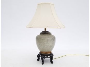 A Vintage Chinoiserie Ceramic Lamp With Silk Shade On Rosewood Base
