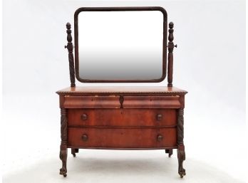 A Late 19th Century Mahogany Veneer And Carved Wood Dresser With Mirror