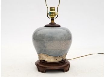 A Ceramic Lamp On Rosewood Base