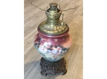 Hand Painted Porcelain Oil Lamp With A  Brass- Footed Base & An Ornately Formed Fuel Chamber