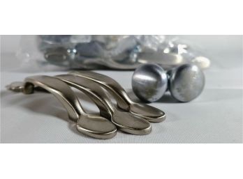 Variety Of Silver Toned Knobs And Door Handles