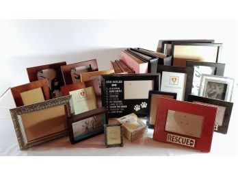 Group Of Picture Frames And Photo Albums