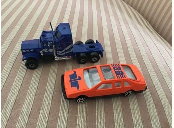 Two Vehicles - Race Car And Truck Cab - Lot #10