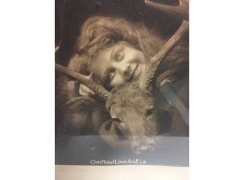 Antique Photo Of A Young Girl Hugging An Elk