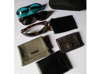 Lot Of Sun Glasses And Wallets