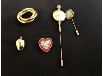 Five Gold Colored Pins