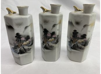 Three Matching Japanese Landscape Tall Jars With Gold Bird On Top
