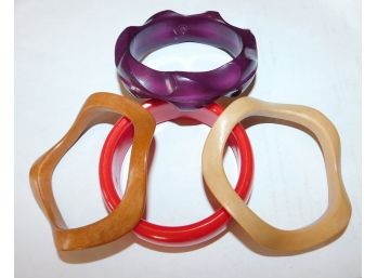FOUR Colorful Hard Plastic Cuffs