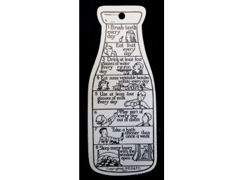 Vintage Dairy Advertisement In The Shape Of A Milk Bottle