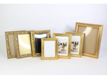 Set Of Gold Frames Of Varying Sizes