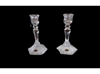 A Pair Of Crystal Or Glass Candle Holders