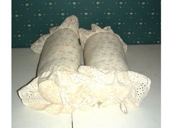 Pair Of Round Bolster Type Pillows With Eyelet Design