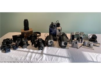 Assortment Of Cameras And Video Equipment