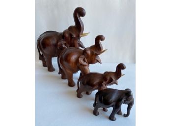 Four Carved Wood Elephants