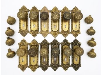 A Set Of 19th Century Cast Bronze Doorknobs And Backplates