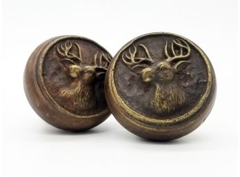 A Pair Of Antique Bronze Doorknobs With Stag Motif