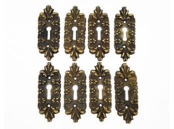 A Set Of Cast Bronze Keyhole Covers