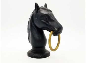 A Vintage Cast Iron Horse With Brass Bit