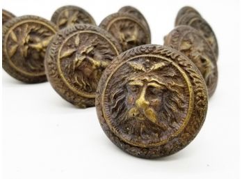 A Set Of Antique Bronze 'Faccia' Motif Doorknobs