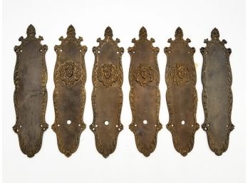 A Set Of Large Antique Bronze 'Faccia' And Scroll Motif Push And Back Plates