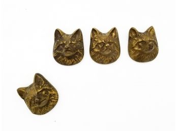 A Set Of 4 Vintage Brass Wolf Head Figurines