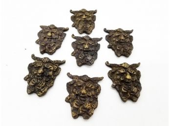 A Set Of 7 Miniature Gargoyle Heads In Bronze