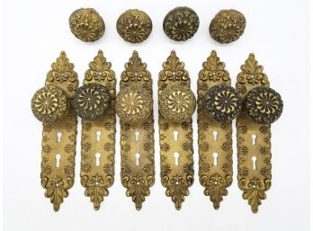 A Grouping Of 19th Century Bronze Doorknobs And Backplates