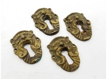 A Set Of 4 Victorian Wrought Iron Keyhole Covers