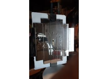 Large Clock Mirror Needs Repair On Clock