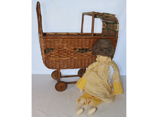 Antique Wicker Carriage And Felt Doll