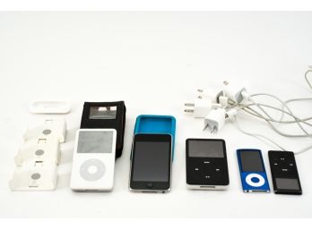 Collection Of Apple IPods And Appropriate Cords