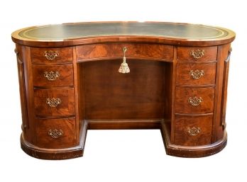 Vintage Kidney Shaped Desk With Nine Drawers And Leather Top (RETAIL $6,450)