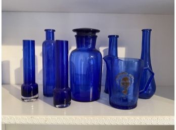 Miscellaneous Collection Of Cobalt Blue Glass Bottles And Shirley Temple Pitcher