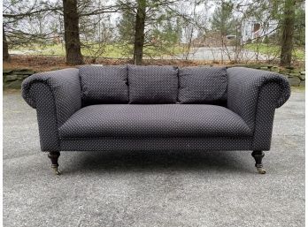 Low Back Roll Arm Upholstered Fabric Sofa With Casters