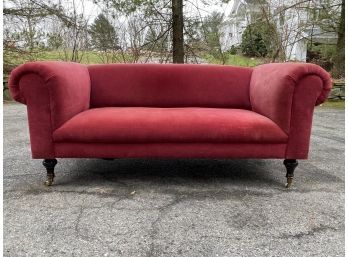 Red Velvet Low Back Roll Arm Sofa With Casters