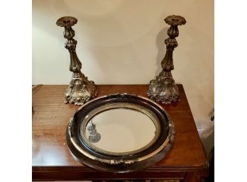 Pair Of Antique Brass Candlesticks And Small Black And Gold Oval Mirror