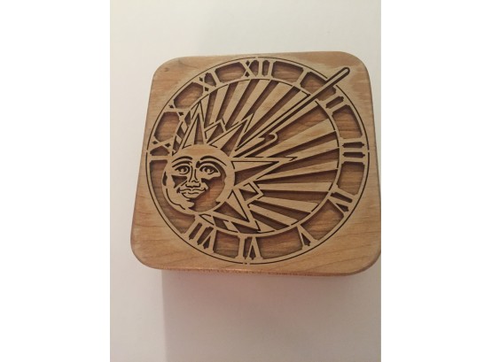 Carved Sun On Wood Block Cover