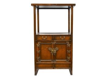 Vintage Cabinet With An Elevated Stand With Butterfly Emblems