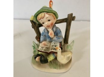 Erich Stauffer Porcelain Figurine. Boy With Duck And Music Book.  #7961