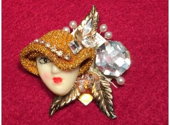 Vintage Woman's Face Pin With Rhinestones And Pearls And A Gold Mesh Hat.