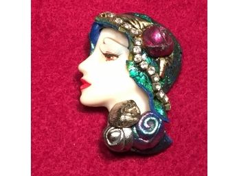 Woman Face Pin With Rhinestones And A Rose.