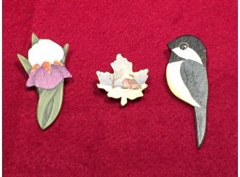 Three Wood Painted Pins. Flower, Bird And Maple Leaf Signed Nancy Rice 1996.