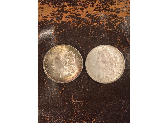 2 Morgan Silver Dollars . 1880    1883. Very Good Cond