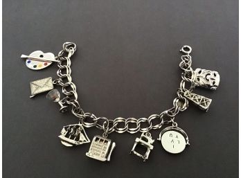 Sterling Silver Charm Bracelet And Nine Charms