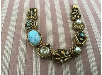 Vintage Nine Link Gold Tone Bracelet With Crown, Heart, Serpent, Etc.