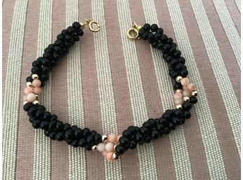 Black Bead, Peach, And Gold Tone Beaded Bracelet - Lot #19